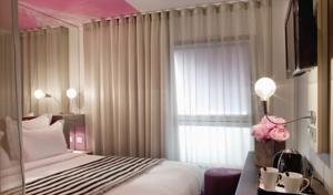 embl�me de l'�tablissement Le 7 Eiffel Hotel